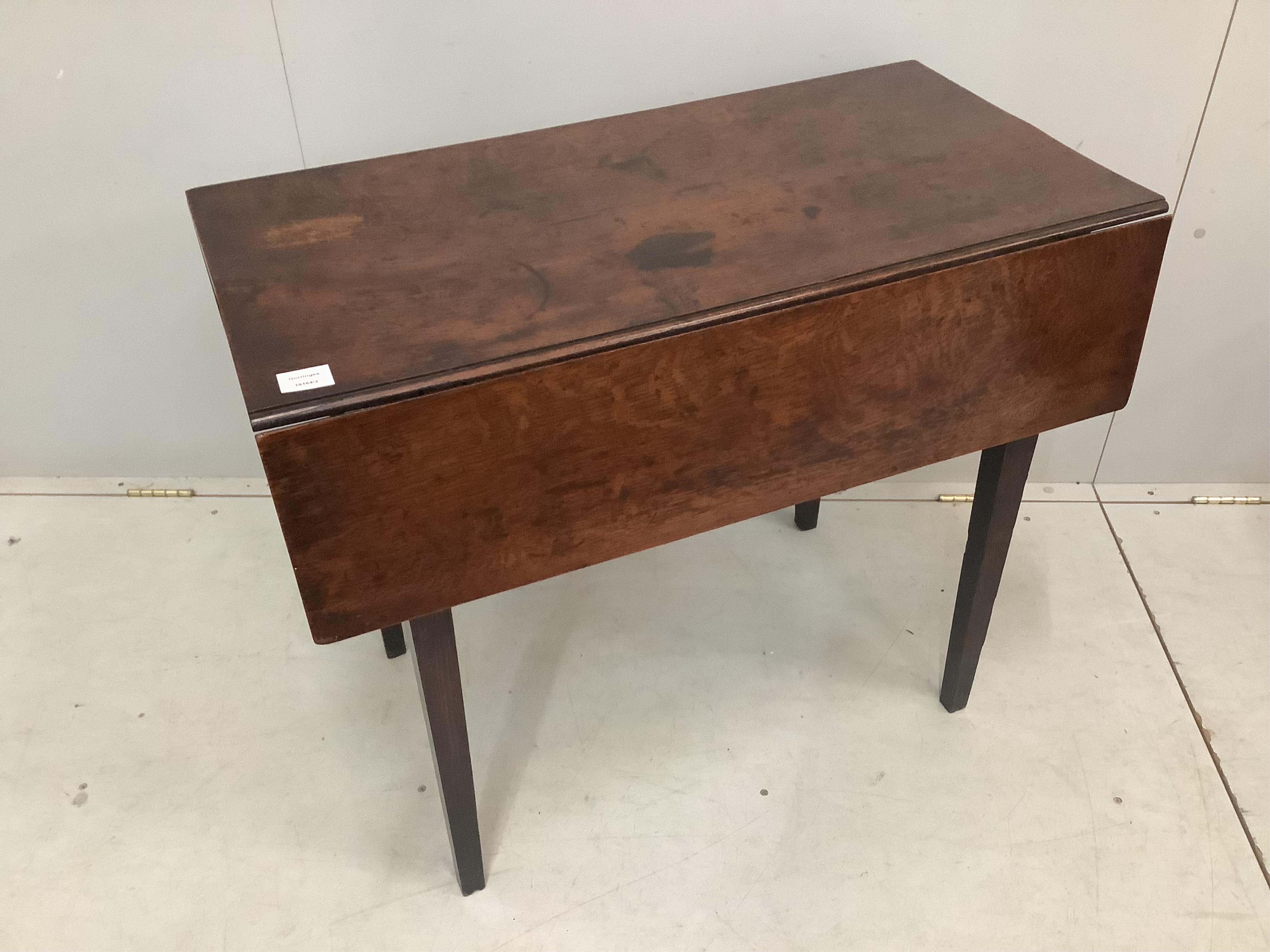 An 18th century Provincial oak drop leaf table, width 87cm, depth 46cm, height 72cm